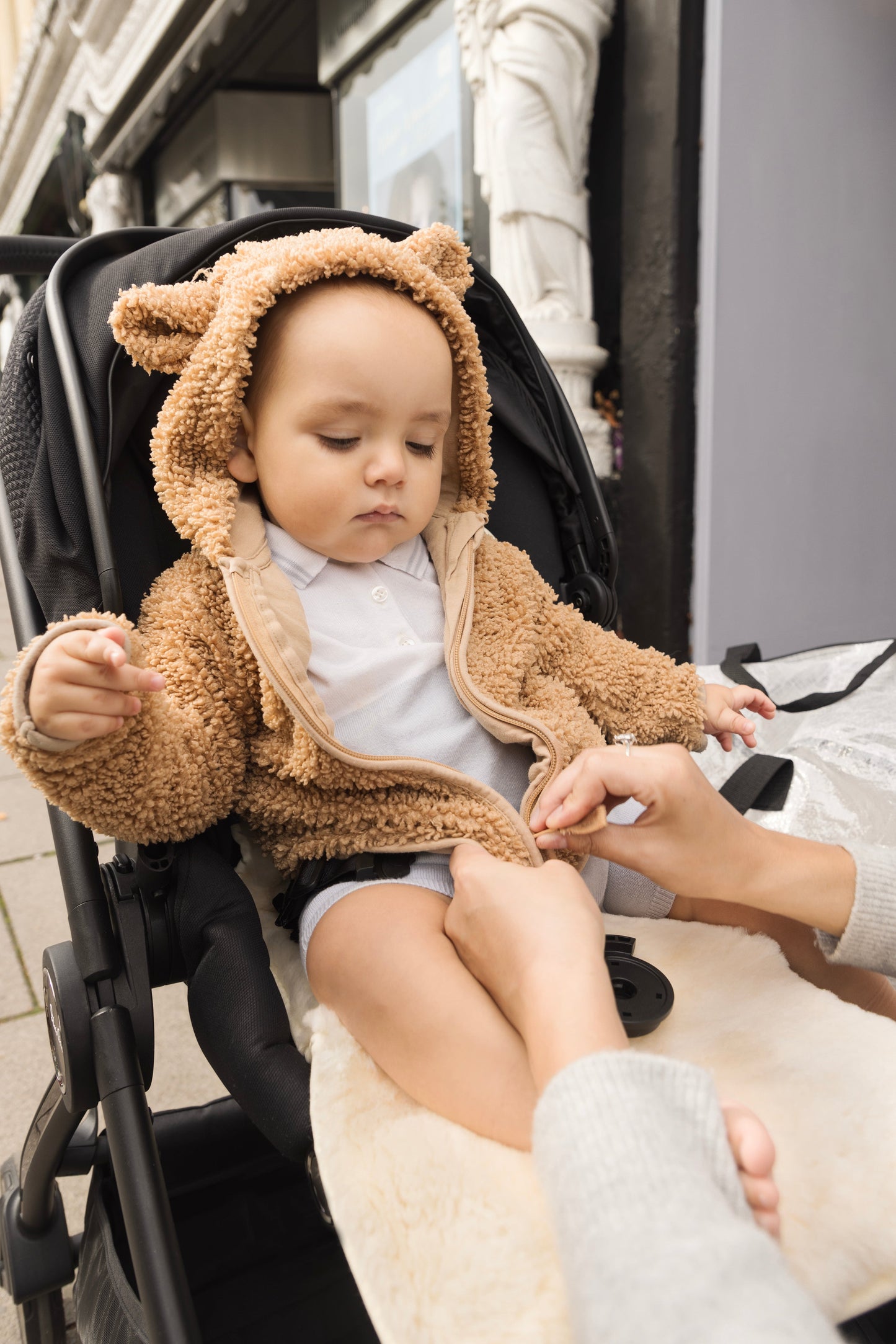 sheepskin pram liner with cotton backing. In silver cross pushchair